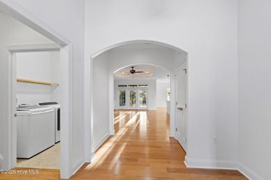 Beautifully built by Trusst, this freshly painted townhome is on Cape Fear National At Brunswick Forest in North Carolina - for sale on GolfHomes.com, golf home, golf lot