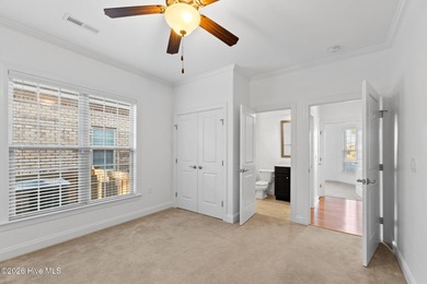 Beautifully built by Trusst, this freshly painted townhome is on Cape Fear National At Brunswick Forest in North Carolina - for sale on GolfHomes.com, golf home, golf lot