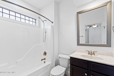 Beautifully built by Trusst, this freshly painted townhome is on Cape Fear National At Brunswick Forest in North Carolina - for sale on GolfHomes.com, golf home, golf lot