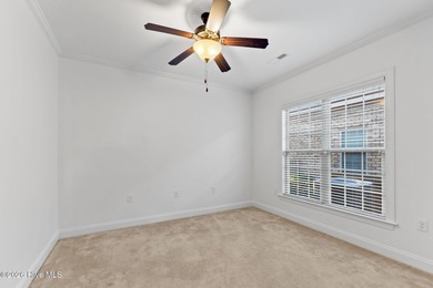 Beautifully built by Trusst, this freshly painted townhome is on Cape Fear National At Brunswick Forest in North Carolina - for sale on GolfHomes.com, golf home, golf lot