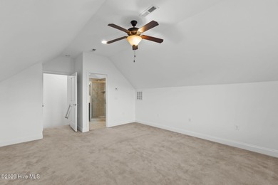 Beautifully built by Trusst, this freshly painted townhome is on Cape Fear National At Brunswick Forest in North Carolina - for sale on GolfHomes.com, golf home, golf lot