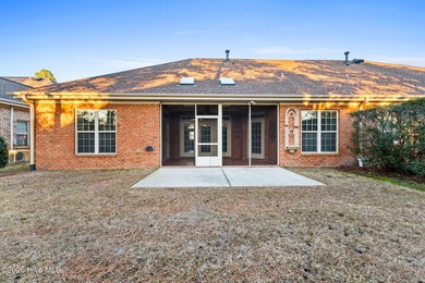 Beautifully built by Trusst, this freshly painted townhome is on Cape Fear National At Brunswick Forest in North Carolina - for sale on GolfHomes.com, golf home, golf lot