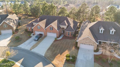 Beautifully built by Trusst, this freshly painted townhome is on Cape Fear National At Brunswick Forest in North Carolina - for sale on GolfHomes.com, golf home, golf lot
