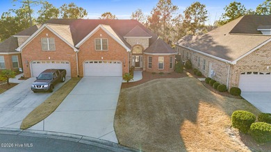 Beautifully built by Trusst, this freshly painted townhome is on Cape Fear National At Brunswick Forest in North Carolina - for sale on GolfHomes.com, golf home, golf lot