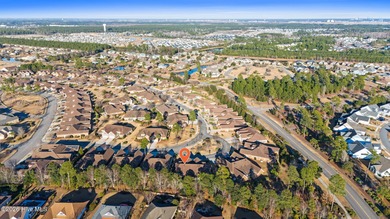 Beautifully built by Trusst, this freshly painted townhome is on Cape Fear National At Brunswick Forest in North Carolina - for sale on GolfHomes.com, golf home, golf lot