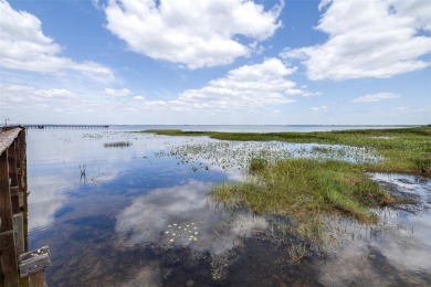 Located in a beautiful gated community, this property offers on Indian Lake Estates Golf and Country Club in Florida - for sale on GolfHomes.com, golf home, golf lot