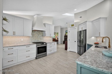 Stunning Waterfront Home in the Sought-After Gated Community of on Sugar Mill Country Club in Florida - for sale on GolfHomes.com, golf home, golf lot