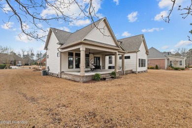 This custom-built home located on the fairway of #16 golf course on Taberna Country Club in North Carolina - for sale on GolfHomes.com, golf home, golf lot