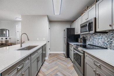 Fully Updated 2-Bedroom, 1-Bathroom Condo Located Within on Hunters Green Country Club in Florida - for sale on GolfHomes.com, golf home, golf lot