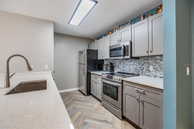 Fully Updated 2-Bedroom, 1-Bathroom Condo Located Within on Hunters Green Country Club in Florida - for sale on GolfHomes.com, golf home, golf lot