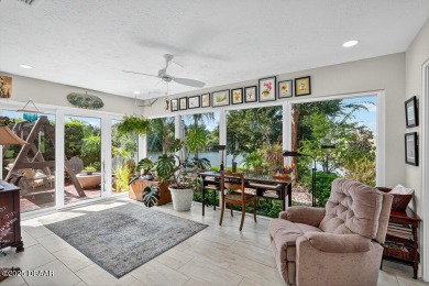 Stunning Waterfront Home in the Sought-After Gated Community of on Sugar Mill Country Club in Florida - for sale on GolfHomes.com, golf home, golf lot