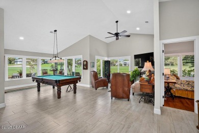 Stunning Waterfront Home in the Sought-After Gated Community of on Sugar Mill Country Club in Florida - for sale on GolfHomes.com, golf home, golf lot