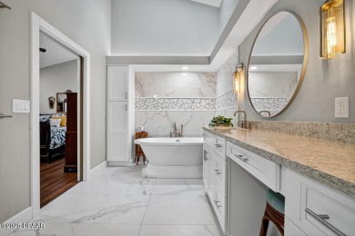 Stunning Waterfront Home in the Sought-After Gated Community of on Sugar Mill Country Club in Florida - for sale on GolfHomes.com, golf home, golf lot