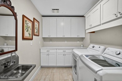 Stunning Waterfront Home in the Sought-After Gated Community of on Sugar Mill Country Club in Florida - for sale on GolfHomes.com, golf home, golf lot