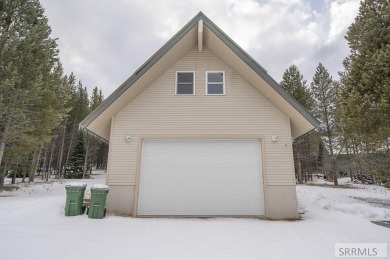 This short term rental sets in the heart of Island Park on Island Park Village Resort Golf Course in Idaho - for sale on GolfHomes.com, golf home, golf lot
