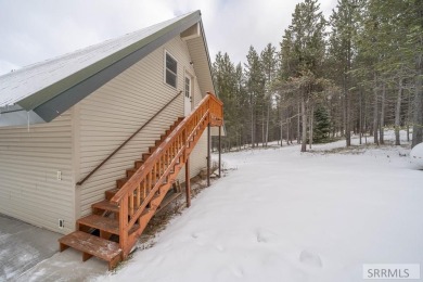 This short term rental sets in the heart of Island Park on Island Park Village Resort Golf Course in Idaho - for sale on GolfHomes.com, golf home, golf lot