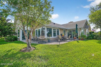 Stunning Waterfront Home in the Sought-After Gated Community of on Sugar Mill Country Club in Florida - for sale on GolfHomes.com, golf home, golf lot