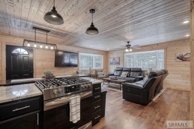 This short term rental sets in the heart of Island Park on Island Park Village Resort Golf Course in Idaho - for sale on GolfHomes.com, golf home, golf lot