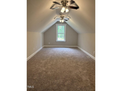 Welcome to 1119 Sagamore Drive, a stunning custom waterfront on River Golf and County Club at Lake Royale in North Carolina - for sale on GolfHomes.com, golf home, golf lot