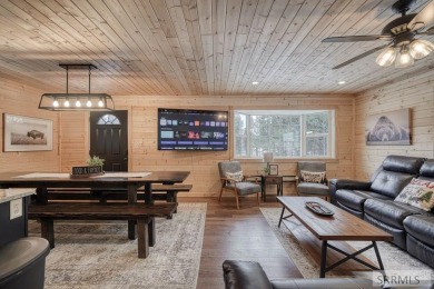 This short term rental sets in the heart of Island Park on Island Park Village Resort Golf Course in Idaho - for sale on GolfHomes.com, golf home, golf lot