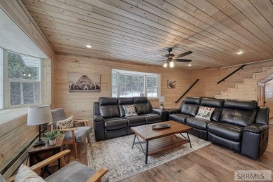This short term rental sets in the heart of Island Park on Island Park Village Resort Golf Course in Idaho - for sale on GolfHomes.com, golf home, golf lot