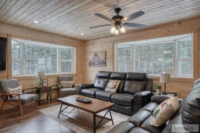 This short term rental sets in the heart of Island Park on Island Park Village Resort Golf Course in Idaho - for sale on GolfHomes.com, golf home, golf lot