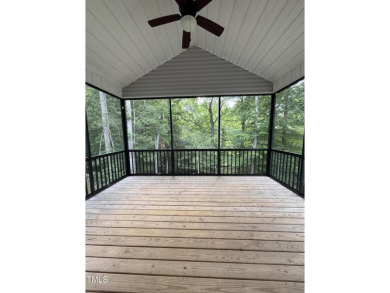 Welcome to 1119 Sagamore Drive, a stunning custom waterfront on River Golf and County Club at Lake Royale in North Carolina - for sale on GolfHomes.com, golf home, golf lot
