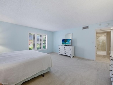 Immerse yourself in golf course living in this preferred on Wilderness Country Club in Florida - for sale on GolfHomes.com, golf home, golf lot