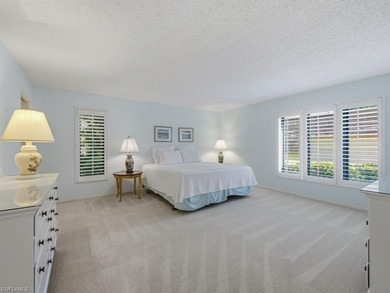 Immerse yourself in golf course living in this preferred on Wilderness Country Club in Florida - for sale on GolfHomes.com, golf home, golf lot