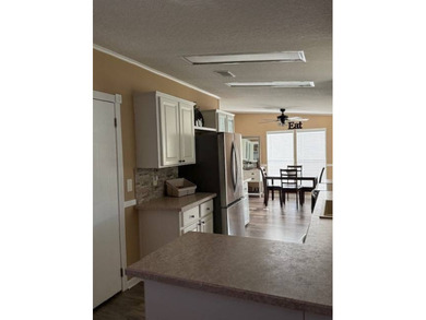 Welcome to resort-style living in one of Polk County's premier on Hamptons Golf Club in Florida - for sale on GolfHomes.com, golf home, golf lot