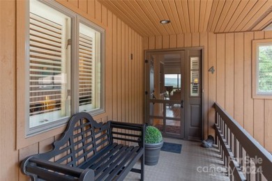 No storm damage! Sweeping, unobstructed MILLION DOLLAR VIEW! on Hendersonville Country Club in North Carolina - for sale on GolfHomes.com, golf home, golf lot