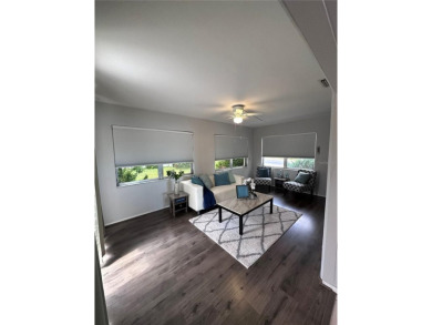 This 2 bedroom 1.5 bath home is located in the 55+ COMMUNITY of on Mainlands Golf Club in Florida - for sale on GolfHomes.com, golf home, golf lot