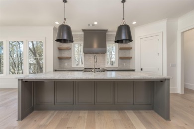 This exquisite new home in the prestigious Richland Pointe on Reynolds Lake Oconee - The Oconee in Georgia - for sale on GolfHomes.com, golf home, golf lot