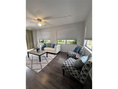 This 2 bedroom 1.5 bath home is located in the 55+ COMMUNITY of on Mainlands Golf Club in Florida - for sale on GolfHomes.com, golf home, golf lot