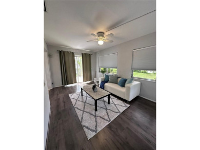 This 2 bedroom 1.5 bath home is located in the 55+ COMMUNITY of on Mainlands Golf Club in Florida - for sale on GolfHomes.com, golf home, golf lot