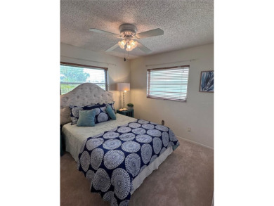 This 2 bedroom 1.5 bath home is located in the 55+ COMMUNITY of on Mainlands Golf Club in Florida - for sale on GolfHomes.com, golf home, golf lot