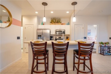 Discover this stunning three-bedroom, two-bath condo--perfect on Tan-Tar-A Golf Club in Missouri - for sale on GolfHomes.com, golf home, golf lot