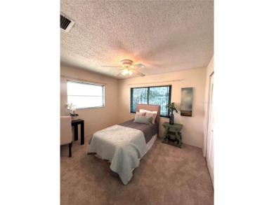This 2 bedroom 1.5 bath home is located in the 55+ COMMUNITY of on Mainlands Golf Club in Florida - for sale on GolfHomes.com, golf home, golf lot