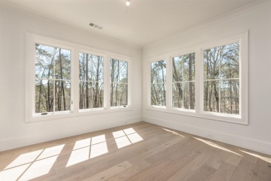 This exquisite new home in the prestigious Richland Pointe on Reynolds Lake Oconee - The Oconee in Georgia - for sale on GolfHomes.com, golf home, golf lot