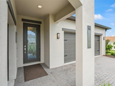 GOLF CART GARAGE faces the side from the front entry hence not on Stonecrest Golf and Club Club in Florida - for sale on GolfHomes.com, golf home, golf lot