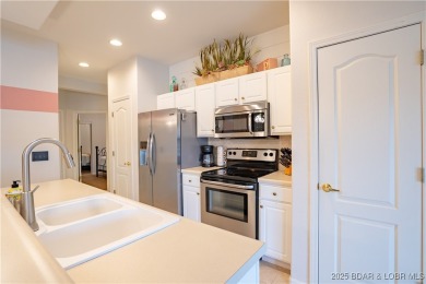 Discover this stunning three-bedroom, two-bath condo--perfect on Tan-Tar-A Golf Club in Missouri - for sale on GolfHomes.com, golf home, golf lot