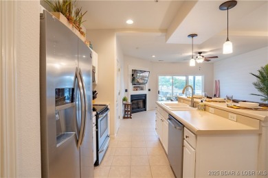 Discover this stunning three-bedroom, two-bath condo--perfect on Tan-Tar-A Golf Club in Missouri - for sale on GolfHomes.com, golf home, golf lot
