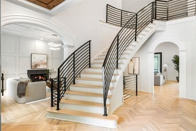 Set at the quiet end of an exclusive cul-de-sac, beyond a secure on Bobby Jones Golf Club in Georgia - for sale on GolfHomes.com, golf home, golf lot