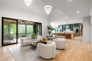 Set at the quiet end of an exclusive cul-de-sac, beyond a secure on Bobby Jones Golf Club in Georgia - for sale on GolfHomes.com, golf home, golf lot