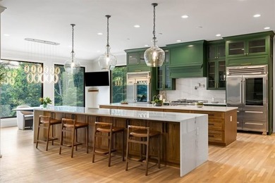 Set at the quiet end of an exclusive cul-de-sac, beyond a secure on Bobby Jones Golf Club in Georgia - for sale on GolfHomes.com, golf home, golf lot