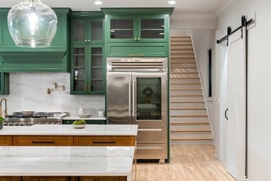 Set at the quiet end of an exclusive cul-de-sac, beyond a secure on Bobby Jones Golf Club in Georgia - for sale on GolfHomes.com, golf home, golf lot