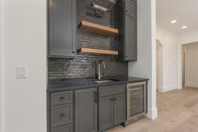 This exquisite new home in the prestigious Richland Pointe on Reynolds Lake Oconee - The Oconee in Georgia - for sale on GolfHomes.com, golf home, golf lot