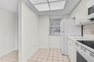 Resort-Style Living in Terra Ceia Bay | Updated 2nd Floor Condo! on Terra Ceia Golf and Country Club in Florida - for sale on GolfHomes.com, golf home, golf lot