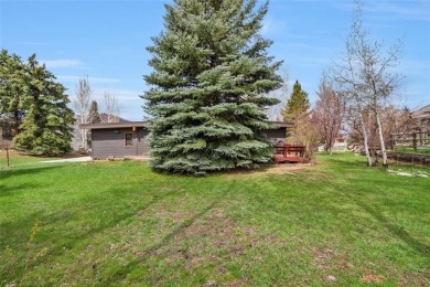 Nestled at the end of a tranquil cul-de-sac in a highly on Rollingstone Ranch Golf Club in Colorado - for sale on GolfHomes.com, golf home, golf lot