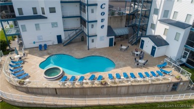 Discover this stunning three-bedroom, two-bath condo--perfect on Tan-Tar-A Golf Club in Missouri - for sale on GolfHomes.com, golf home, golf lot